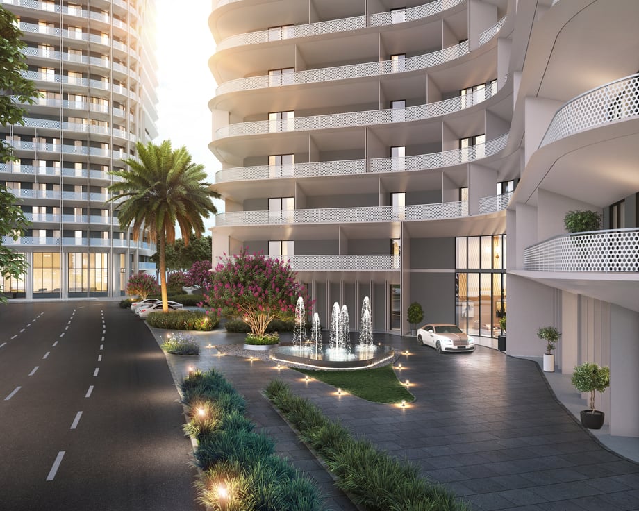 A curved building showcasing luxury apartments in Pakistan through CGI with foliage and fountains in the outdoor entrance area