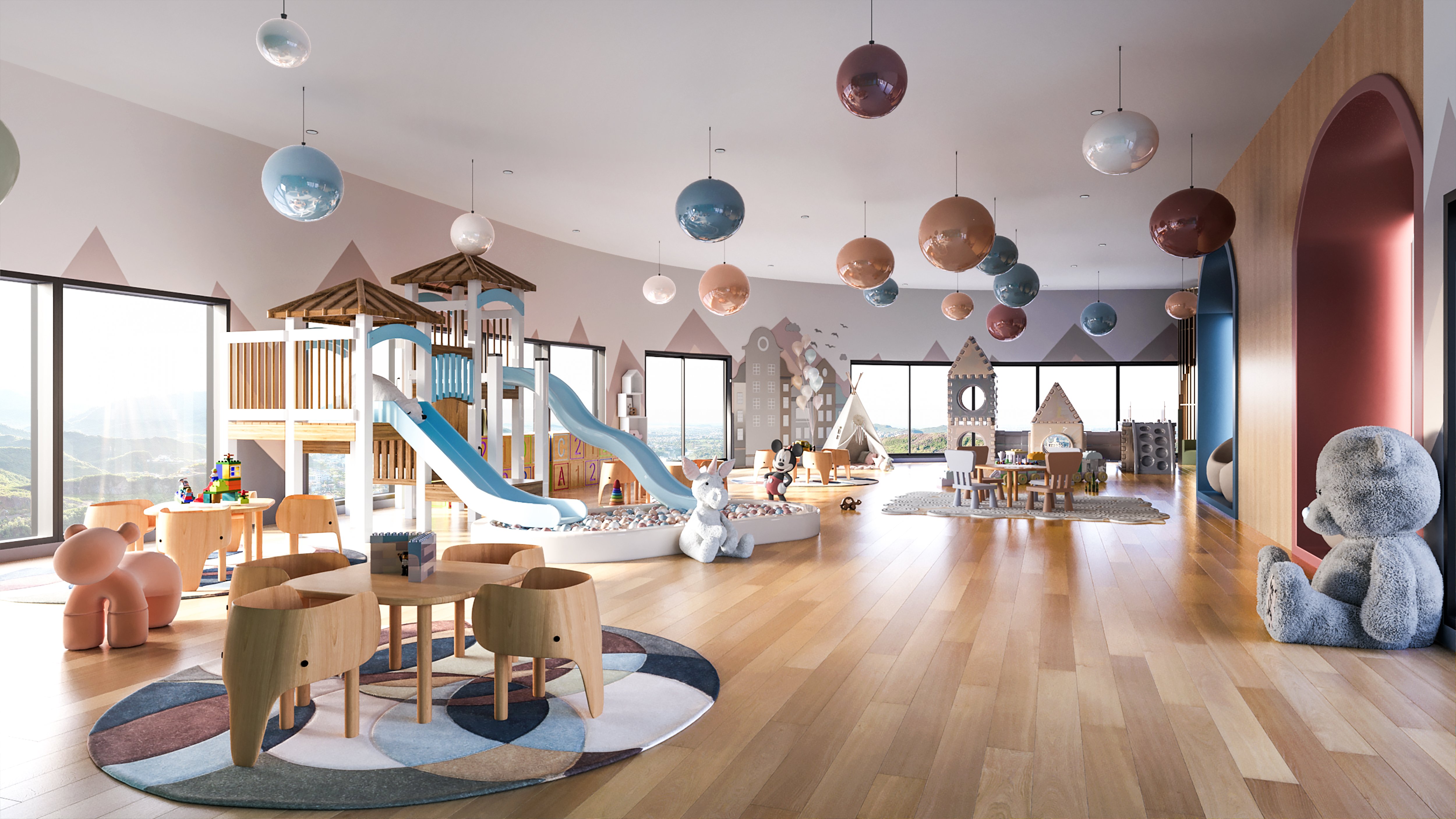 A colourful room with an indoor play structure, hanging lights, a large plush bear and an elephant-themed desk and chair