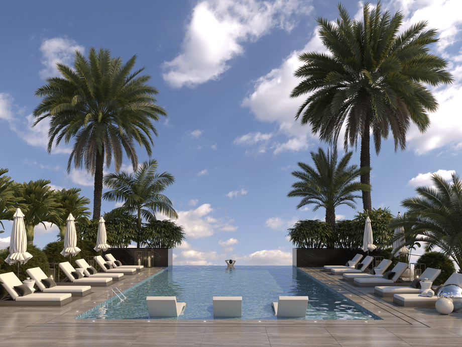 Infinity rooftop pool at One Canal Residences with palm trees, sun loungers, and panoramic sky views in Lahore.