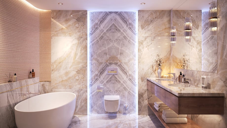 A luxurious stone and wood finished bathroom with neutral colours and an earthy aesthetic