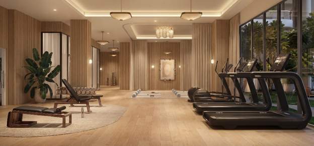Luxury residents' fitness centre in a premium new-build One Homes development featuring modern gym equipment, elegant interiors and wellness-focused amenities for overseas Pakistani property buyers.