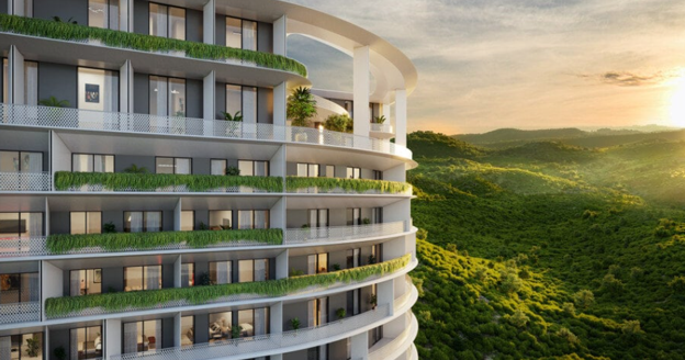 Modern luxury residential building overlooking the lush green hills surrounding Islamabad during sunset
