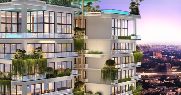 Exterior view of a modern luxury residential apartment tower in Lahore featuring spacious balconies, landscaped terraces, and contemporary architecture.