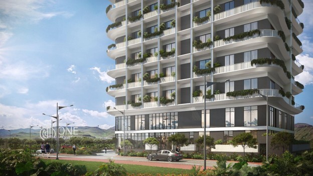 CGI view of Diyàr residences’ modern architecture surrounded by greenery and mountains visible in the distance, a high-appreciation property designed for families looking for wellness, peace of mind, and ROI