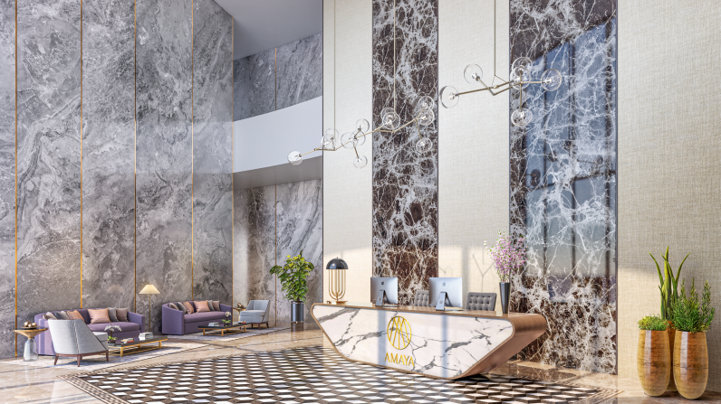 Luxurious marble lobby of Amaya Residences Islamabad with reception desk, purple seating, chandelier, and planters, illustrating upscale real estate in Pakistan