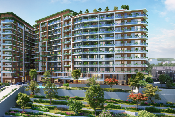 A large residential building stands tall surrounded by greenery