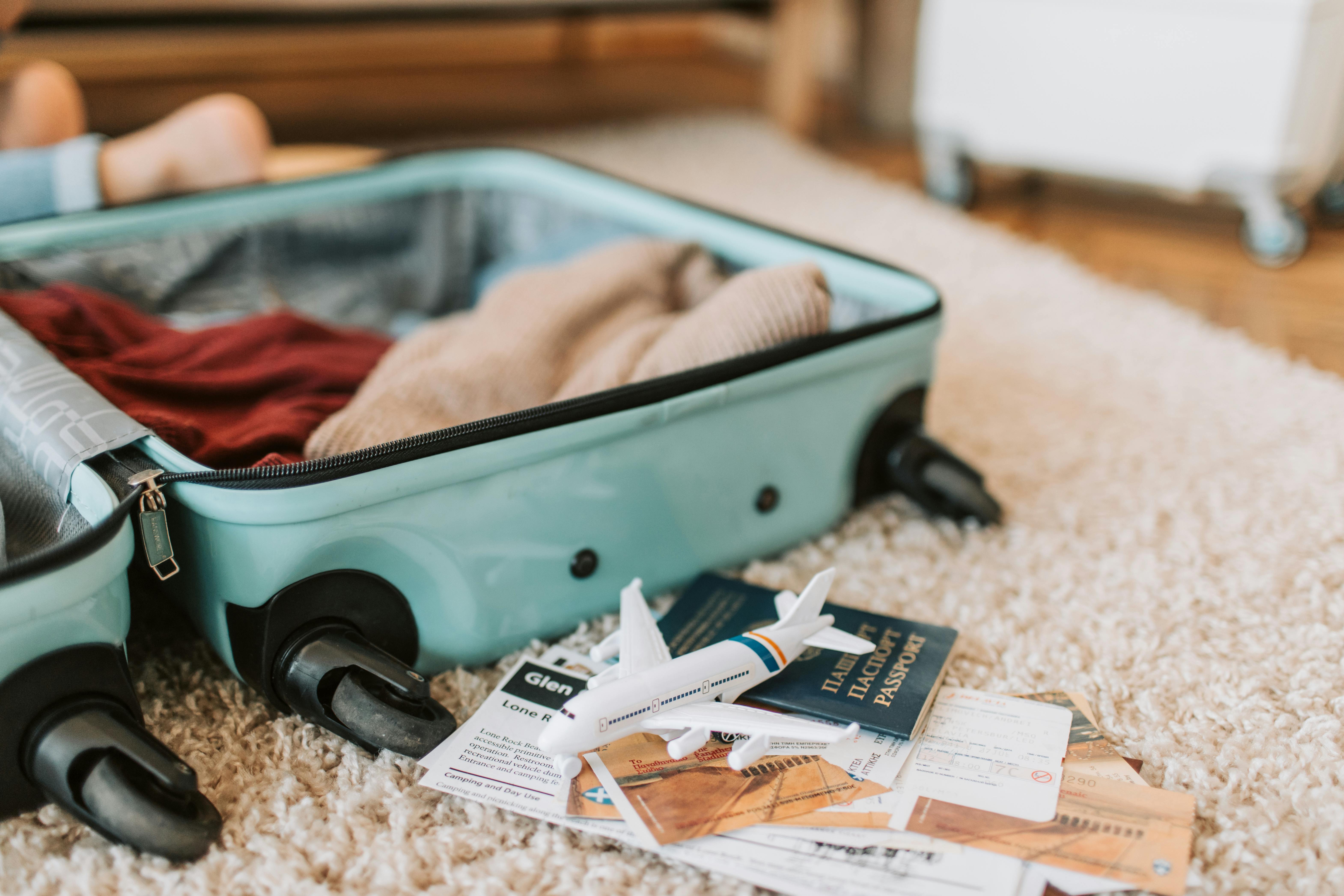 : A suitcase being packed for an overseas vacation